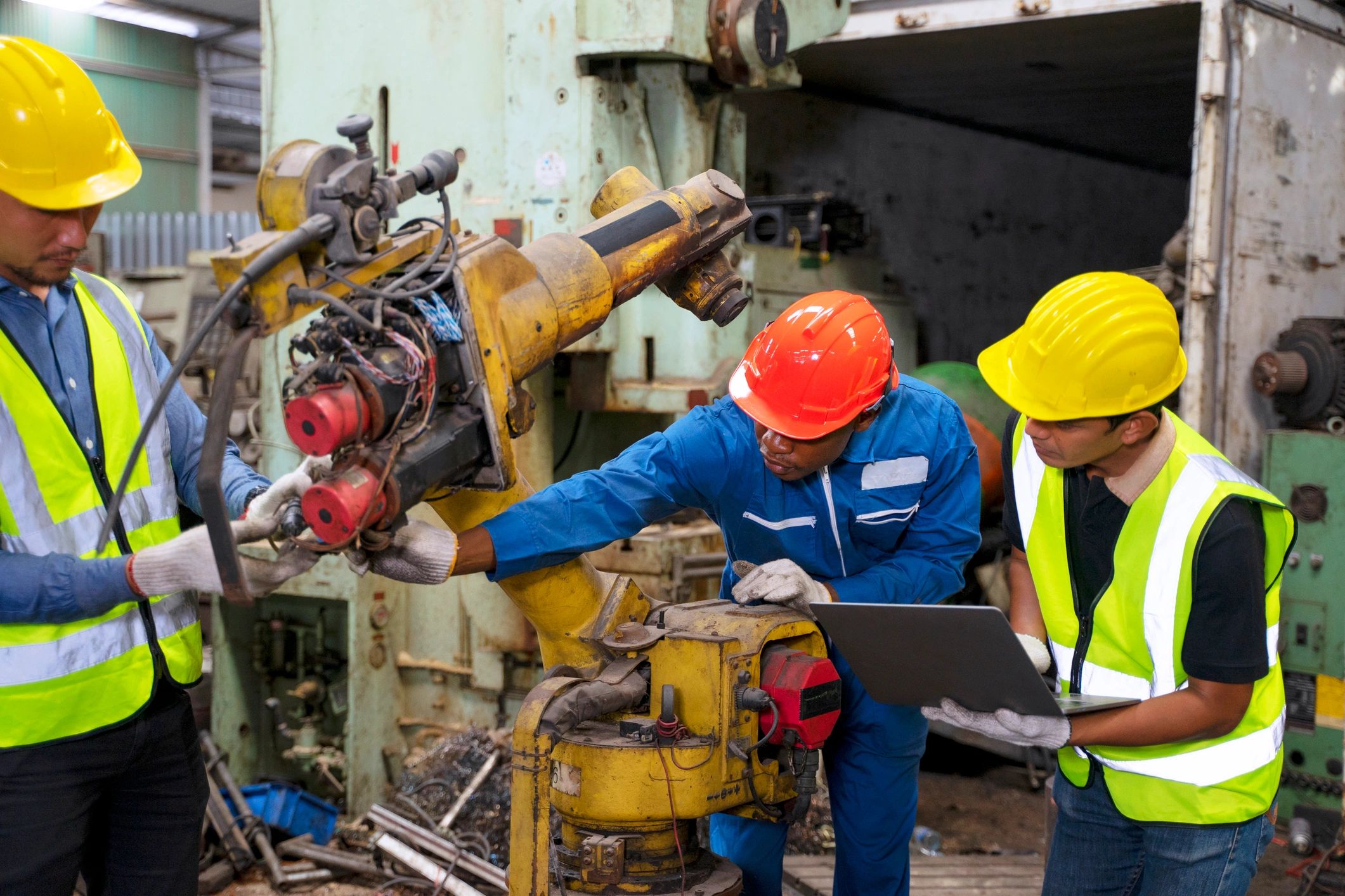 Engineer operating industrial machinery